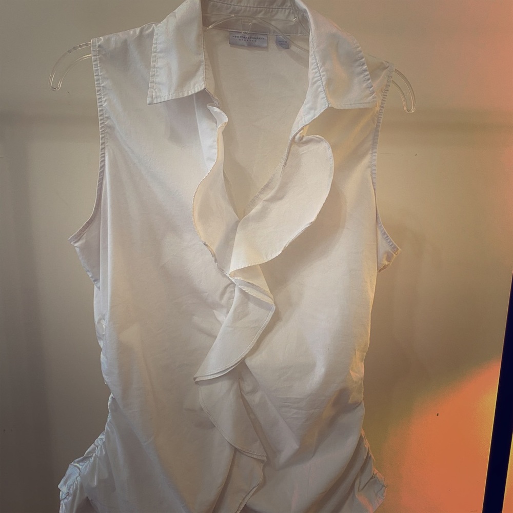 White ruffled top